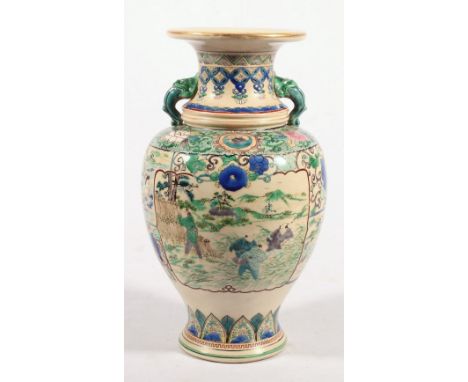 Japanese Kutani vase of baluster form with lion head handles decorated in famille verte enamels depicting farmers in a landsc