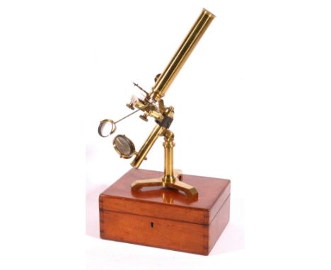 Victorian L Dixey of Brighton lacquered brass compound monocular microscope, with mechanical stage and tripod y shaped base, 