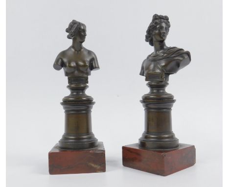 A pair of 20thC bronze busts, on marble bases, 16cm high