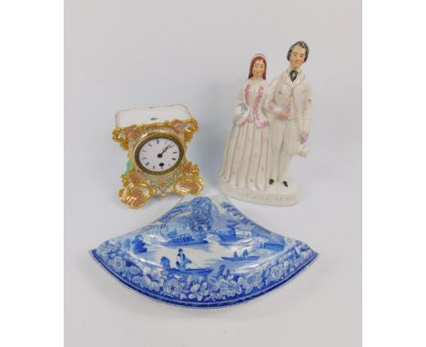A Staffordshire late 19thC flat back pottery figure group of the Prince and Princess, blue and white supper segment decorated