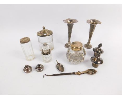 A silver top crystal inkwell, other silver top jars, bud vases, etc.