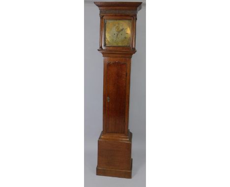 A George III oak longcase clock by John Agar of York, with moulded and blind fret hood, full length trunk door and plain base