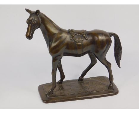 A loaded bronze figure of a horse, modelled standing, on an oblong base, 28.5cm x 13cm x 32cm.