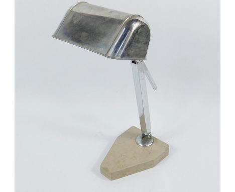 An Artisanat Francais early 20thC anglepoise desk lamp, raised on a polished stone base, 42.5cm high.