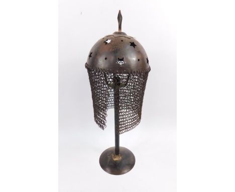 An Ottoman type steel helmet with a chain mail face guard, converted to a table lamp, 51cm high.