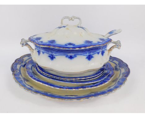 A Grindley late 19thC flow blue and white pottery part dinner service, decorated in the Derwent pattern, comprising seven mea
