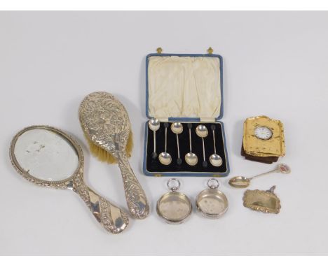 A George V silver backed hair brush embossed with a cherub and ivy, Birmingham 1918, silver backed hand mirror, Birmingham 19