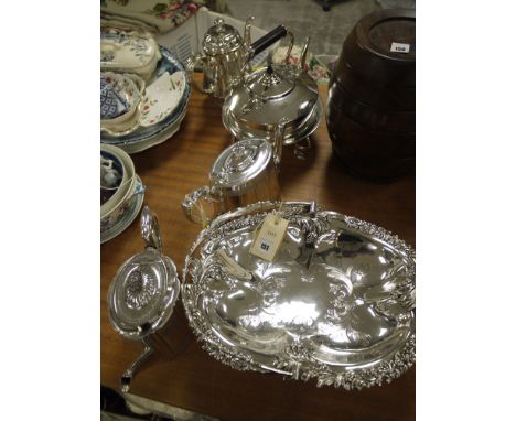 An EPNS spirit kettle and stand; plated cake basket with ornate swing handle; three plated tea pots, various.