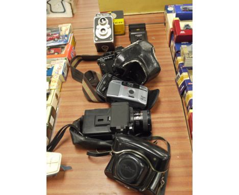 A collection of cameras; etc., comprising: a Halina-Viceroy LPL splicer; a Cobra flash unit; a Yashika FX-3 Super; an Olympus