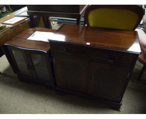 A reproduction inlaid mahogany small side cabinet with crossbanded edge, two shallow drawers to the frieze and a cupboard bel