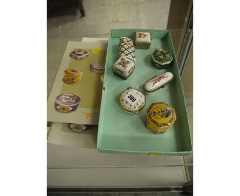 A collection of seven modern porcelain trinket boxes, various, by Del Prado; together with booklets and a file.