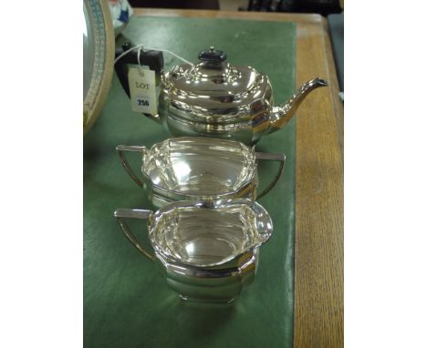 A three-piece EPNS tea service of plain rectangular form with canted corners, impressed mark on the base GWF.