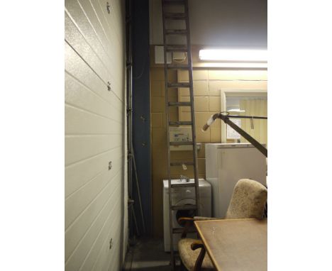 An aluminium extending ladder.