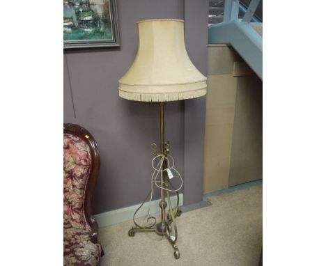 A 19th Century wrought brass and copper lamp standard, adjustable for height and converted to electricity, fitted with a gold