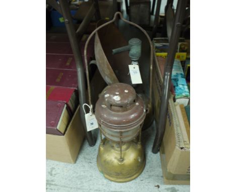 A Tilley paraffin lamp; and a Tilley radiator with copper reflector.