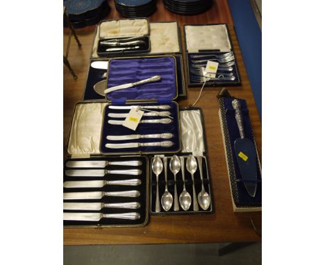 A collection of boxed set of teaspoons, tea knives, etc.