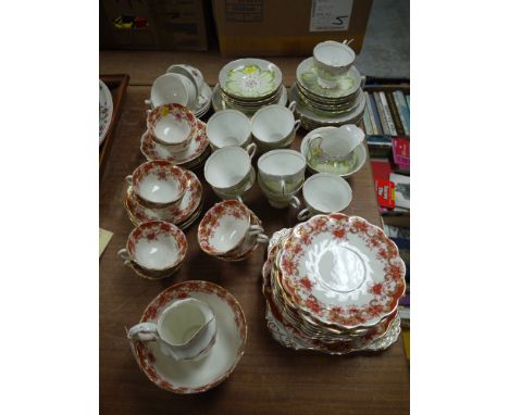 A Tuscan bone china part afternoon tea service, c.1930's, with floral design; a late Victorian part tea service; together wit