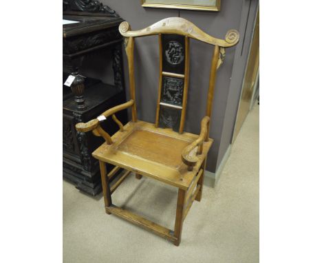 An early 20th Century Chinese light hardwood chair, the shaped scrolling cresting rail above panel splat back with pierced ch