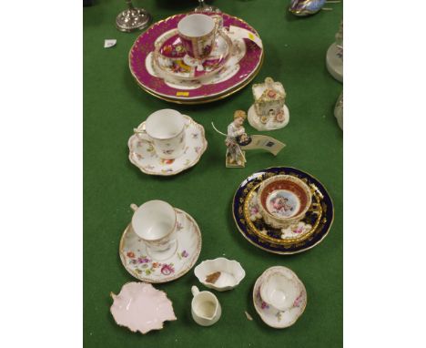 A collection of miscellaneous decorative china, including: specimen tea cups and saucers; a figure of a boy with a basket; a 