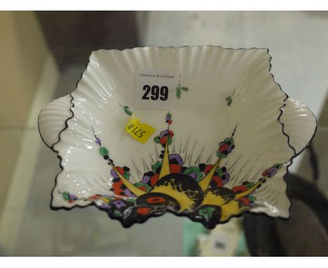 An early 20th Century Shelley trinket dish with Art Deco style stylized floral decoration, in green, yellow, red and black on