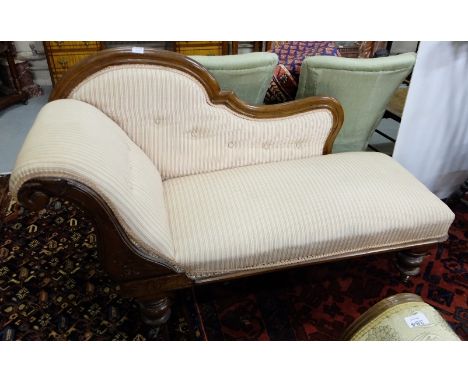 Victorian Mahogany Framed Chaise Longe, with a scroll- shaped back and side arm, on 4 turned feet, red and white stripped fab