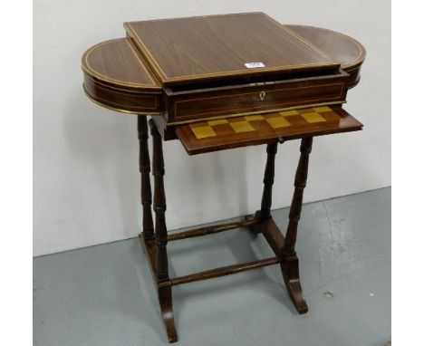 Edwardian Rosewood Games Table, inlaid with Satinwood, oval sides and sliding top to leather backgammon board, sliding draugh