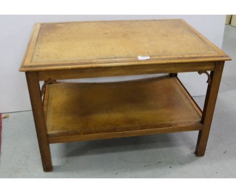 Mahogany framed coffee table, with tooled brown leather to top and on stretcher shelf, square legs 28”w x 19”d