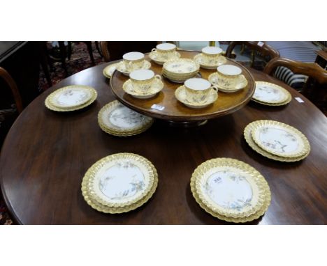 French Porcelain Tea Service by Grand Depot, Paris, incl. side plates (2 sizes), tea cups, saucers (31 pieces), a floral cent