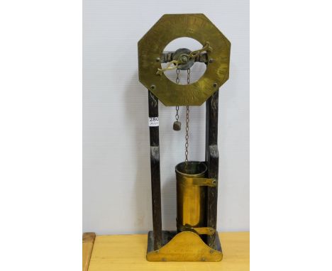 Antique Brass and Wood Water Clock, octagonal dial, the base plated engraved “R Smythe of Ye Town of Bristol 1691”