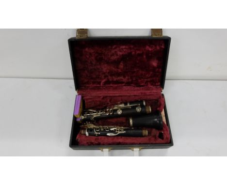 Clarinet with silver plate mounts, in carrying case