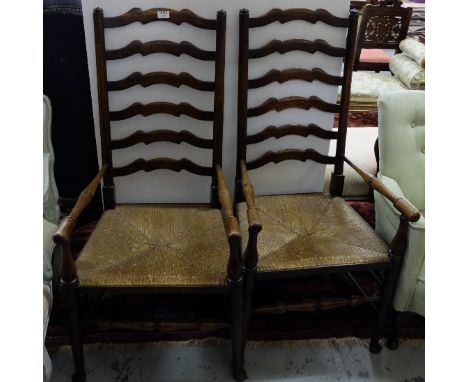 Matching pair of Oak Ladder Back Armchairs, with rush seats