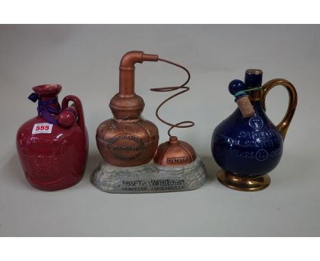 A bottle of Evan Williams 'Kentucky Straight Bourbon Whisky', in novelty pottery cistern decanter (seal broken); together wit