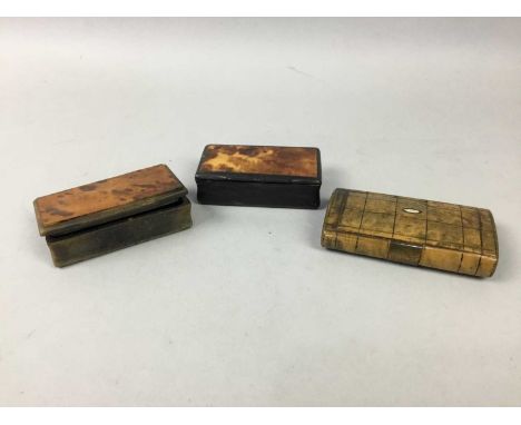 THREE SNUFF BOXES,along with a seal, a spaniel cane topper, a Silver City automobile badge, an enamelled lighter, African nai