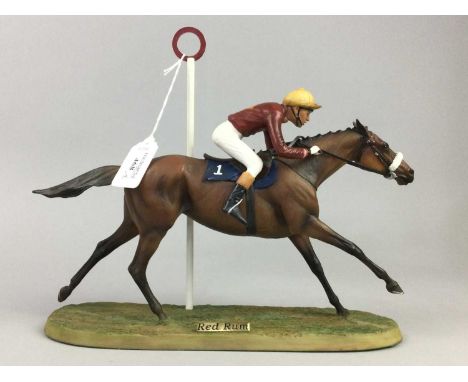 DANBURY MINT FIGURE OF 'RED RUM',modelled passing the winning post, 31cm wide, along with a Royal Doulton ceramic figure of '