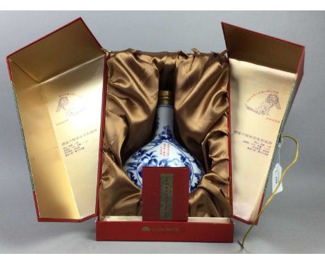 LATE 20TH CENTURY CHINESE WINE,in blue and white ceramic decanter and fitted box, the box 36cm high