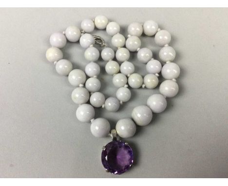 JADE NECKLACE,with large amethyst drop, along with niello brooch and an unmarked white metal with early paste set buckle (3)