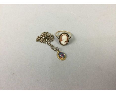 GOLD CAMEO RING,along with a metal opal doublet pendant (2)