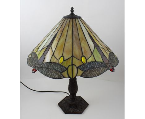 A Tiffany-style table lamp with baluster column support decorated with acanthus leaves to octagonal floral base with a Tiffan