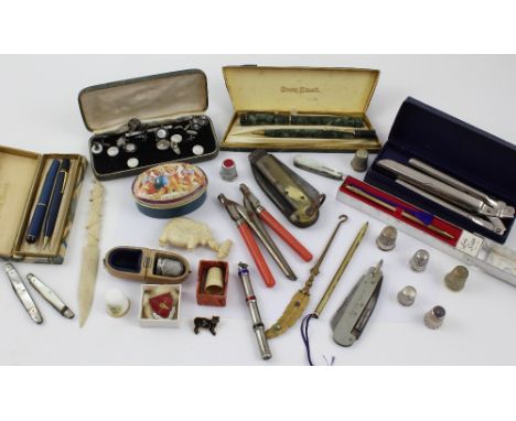 A collectors' lot to include cased vintage pens, a Conway Stewart marble case pen and ballpoint, propelling pencils, various 