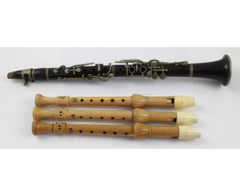 A Besson alto clarinet in black leather travel case, length 47.5cm and three Schott fruitwood recorders (4).