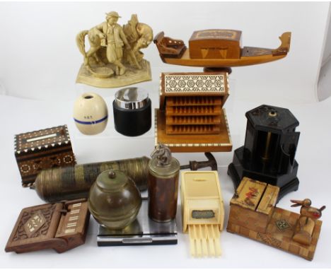 A group of tobacciana, mainly novelty cigarette holders to include carved wooden piano, musical merry-go-round, a Eichwald ex