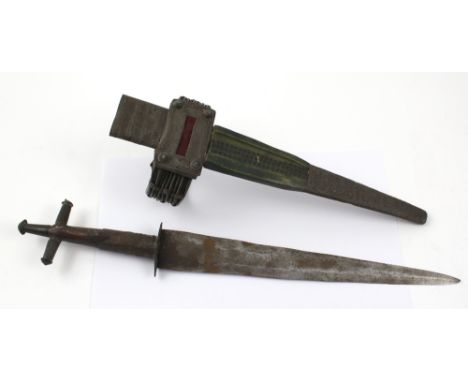 A Victorian Anglo-Indian dagger with cruciform handle and coloured leather and metal scabbard with leather arm strap, the bla