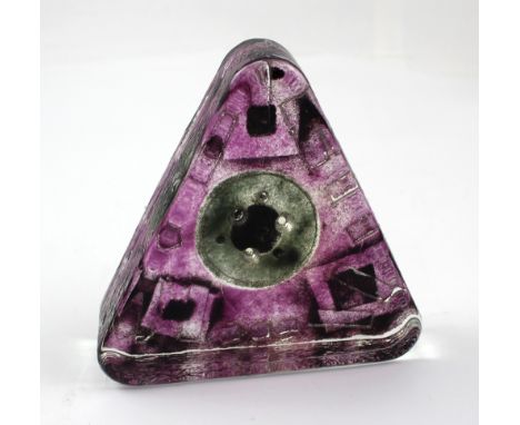 A Caithness-style sand-cast triangular paperweight with relief moulded geometric design, height 17cm.