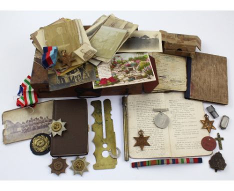 A vintage box containing a group of four WWII medals relating to James McDonnell to include the 1939-45 Star, the Italy Star,