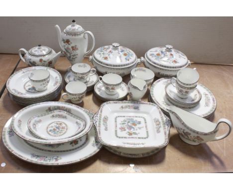 A Wedgwood Kutani pattern part coffee and dinner service comprising coffee pot, height 26.5cm, milk jug, four cups, three sau