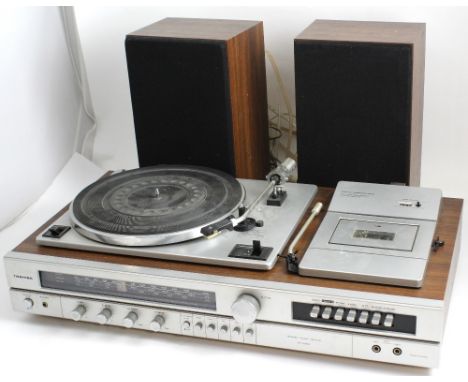 A vintage Toshiba SM2900 stereo music centre with record player, tape deck and tuner, width 69cm and two Toshiba speakers (3)