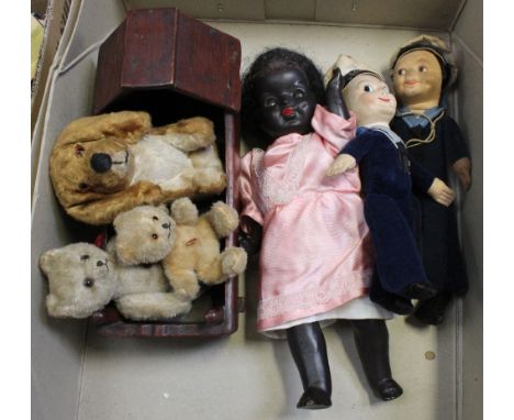 A small collection of dolls and teddy bears to include two Schuco-style bears of graduated size with rotating heads and artic