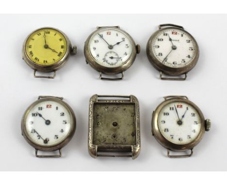 Six hallmarked silver and white metal ladies' wristwatches, four with white enamel dials set with Arabic numerals and one wit