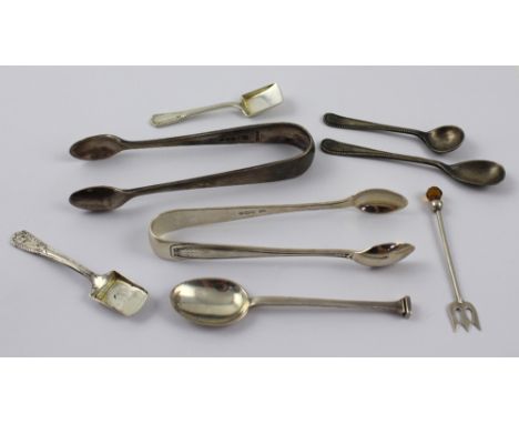 A collection of silver tongs, novelty salt spoons etc, to include two spade-shaped salt spoons, two sets of tongs, a small si