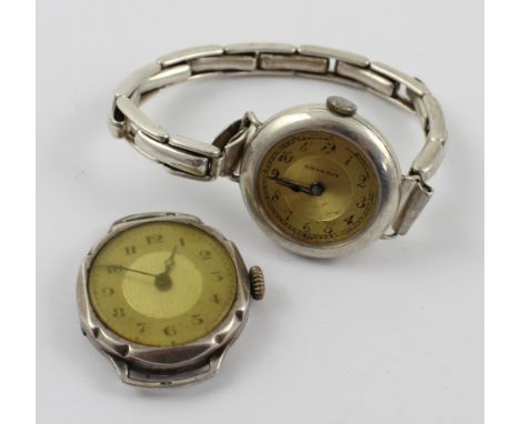 A sterling silver manual-wind bracelet watch and a hallmarked silver trench watch (2). CONDITION REPORT Please note we are un